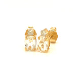 Aretes de topacio blanco con diamantes en oro amarillo 14kt.