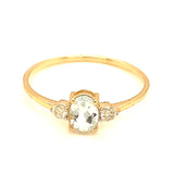 Anillo de aguamarina con diamantes en oro amarillo 14kt.