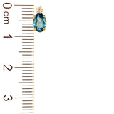 Aretes de topacio azul con diamantes en oro amarillo 14kt.