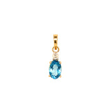 Dije de topacio azul con diamantes en oro amarillo 14kt.