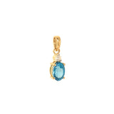 Dije de topacio azul con diamantes en oro amarillo 14kt.