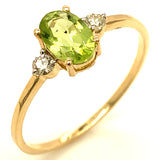 Anillo de peridoto con diamantes en oro amarillo 14kt.