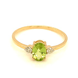 Anillo de peridoto con diamantes en oro amarillo 14kt.