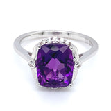 Anillo de amatista con circones en plata 925.