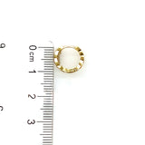 Huggies con circones en oro amarillo 10kt.