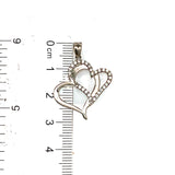 Dije (corazones) con circones en oro blanco 10kt.