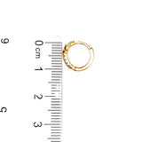 Huggies con circones en oro amarillo 10kt.