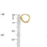 Huggies con circones en oro amarillo 10kt.