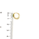 Huggies con circones en oro amarillo 10kt.