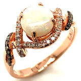 Anillo de ópalo con diamantes en oro rosado 14kt.