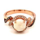 Anillo de ópalo con diamantes en oro rosado 14kt.