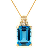 Collar de topacio azul con diamantes en oro amarillo 14kt.