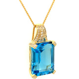 Collar de topacio azul con diamantes en oro amarillo 14kt.