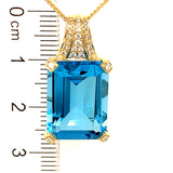 Collar de topacio azul con diamantes en oro amarillo 14kt.