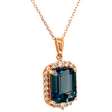 Collar de topacio azul con diamantes en oro rosado 14kt.