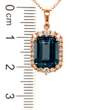 Collar de topacio azul con diamantes en oro rosado 14kt.