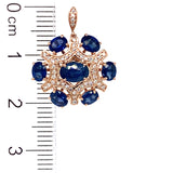 Aretes con zafiros y diamantes en oro rosado 14kt.