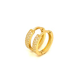 Huggies con circones en oro amarillo 10kt.