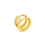 Huggies con circones en oro amarillo 10kt.