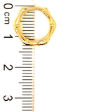 Huggies con circones en oro amarillo 10kt.