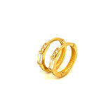 Huggies con circones en oro amarillo 10kt.