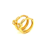 Huggies con circones en oro amarillo 10kt.