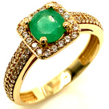 Anillo de esmeralda con circones en oro amarillo 14kt.