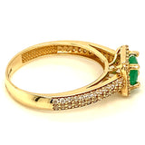 Anillo de esmeralda con circones en oro amarillo 14kt.
