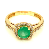 Anillo de esmeralda con circones en oro amarillo 14kt.