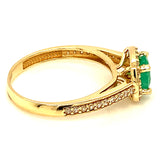 Anillo de esmeralda con circones en oro amarillo 14kt.