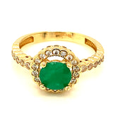 Anillo de esmeralda con circones en oro amarillo 14kt.