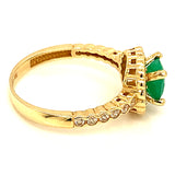 Anillo de esmeralda con circones en oro amarillo 14kt.