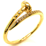 Anillo (Clavo) con circones en oro amarillo 10kt.