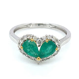 Anillo de esmeraldas con diamantes en oro blanco 18kt.