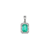 Dije de esmeralda con diamantes en oro blanco 18kt.