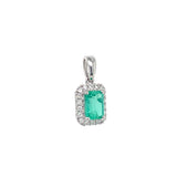 Dije de esmeralda con diamantes en oro blanco 18kt.