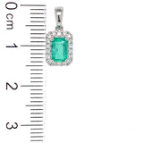 Dije de esmeralda con diamantes en oro blanco 18kt.