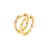 (MIA) Huggies con diamantes en oro amarillo 18kt. D-0.15CTS.