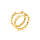 (MIA) Huggies con diamantes en oro amarillo 18kt. D-0.15CTS.