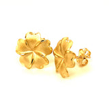 Aretes flor) en oro amarillo 10kt.