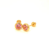 Aretes con circones en oro amarillo 14kt. (Octubre)
