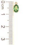Aretes de esmeraldas con diamantes en oro amarillo 14kt. E-0.92CTS. D-0.12CTS.