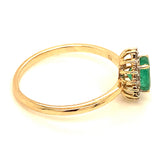 Anillo de esmeralda con diamantes en oro amarillo 14kt. E-0.64CTS. D-0.11CTS.