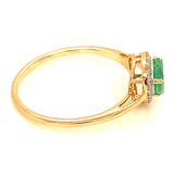Anillo de esmeralda con diamantes en oro amarillo 14kt. E-0.55CTS. D-0.11CTS.