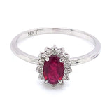 Anillo de rubí con diamantes en oro blanco 14kt. R-0.50CTS. D-0.12CTS.