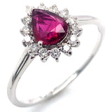 Anillo de rubí con diamantes en oro blanco 14kt. R-0.67CTS. D-0.18CTS.