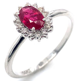 Anillo de rubí con diamantes en oro blanco 14kt. R-0.55CTS. D-0.13CTS.