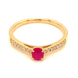 Anillo de rubí con diamantes en oro amarillo 14kt. R-0.33CTS. D-0.11CTS.