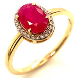 Anillo de rubí con diamantes en oro amarillo 14kt. R-1.22CTS. D-0.08CTS.