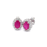 Aretes de rubíes con diamantes en oro blanco 14kt. R-0.93CTS. D-0.26CTS.